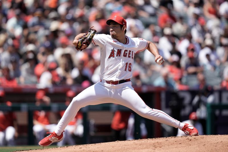 Apr 20, 2025; Anaheim, California, USA; Los Angeles Angels starting pitcher Yusei Kikuchi (16) throws in the second inning against the San Francisco Giants at Angel Stadium. Mandatory Credit: Kirby Lee-Imagn Images