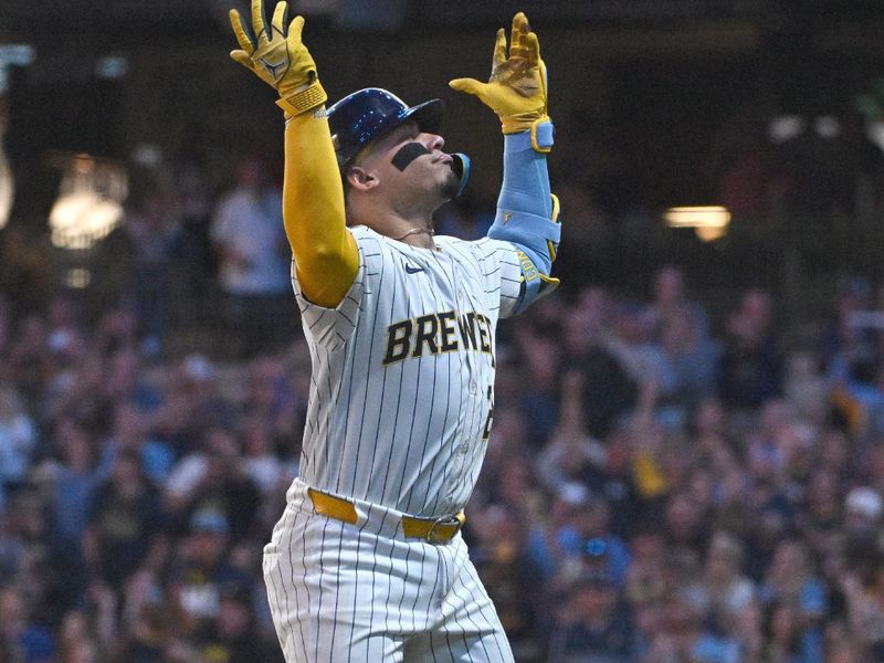 Sep 7, 2024; Milwaukee, Wisconsin, USA; Milwaukee Brewers catcher William Contreras (24) celebrates as he rounds the bases after hitting home run against the Colorado Rockies in the third inning at American Family Field. Mandatory Credit: Michael McLoone-Imagn Images