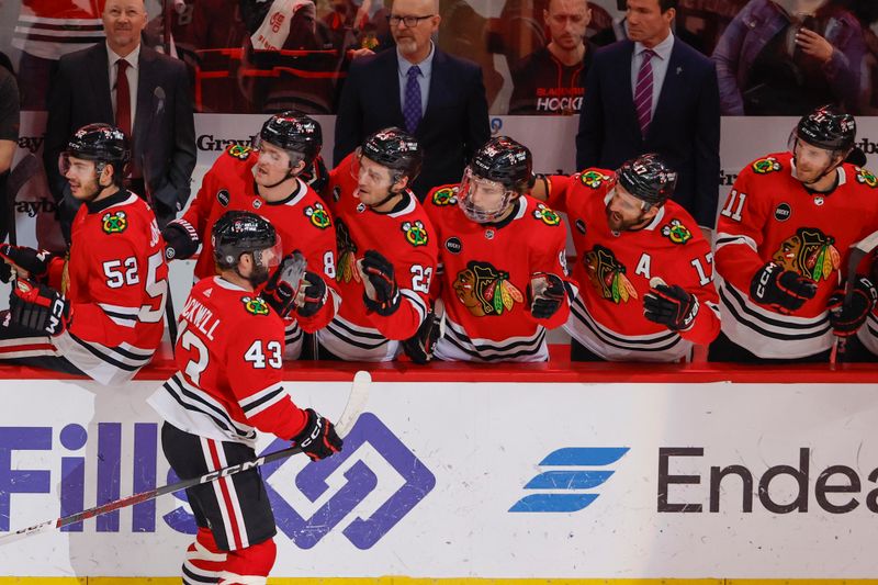 Feb 21, 2024; Chicago, Illinois, USA; Chicago Blackhawks center Colin Blackwell (43) celebrates with teammates after scoring against the Philadelphia Flyers during the first period at United Center. Mandatory Credit: Kamil Krzaczynski-USA TODAY Sports