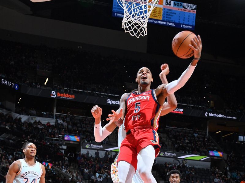 SAN ANTONIO, TX - DECEMBER 8: Dejounte Murray #5 of the New Orleans Pelicans drives to the basket during the game against the San Antonio Spurs on December 8, 2024 at the Frost Bank Center in San Antonio, Texas. NOTE TO USER: User expressly acknowledges and agrees that, by downloading and or using this photograph, user is consenting to the terms and conditions of the Getty Images License Agreement. Mandatory Copyright Notice: Copyright 2024 NBAE (Photos by Michael Gonzales/NBAE via Getty Images)