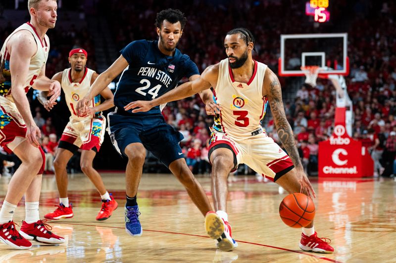 Feb 17, 2024; Lincoln, Nebraska, USA; Nebraska Cornhuskers guard Brice Williams (3) drives against Penn State Nittany Lions forward Zach Hicks (24) during the first half at Pinnacle Bank Arena. Mandatory Credit: Dylan Widger-USA TODAY Sports