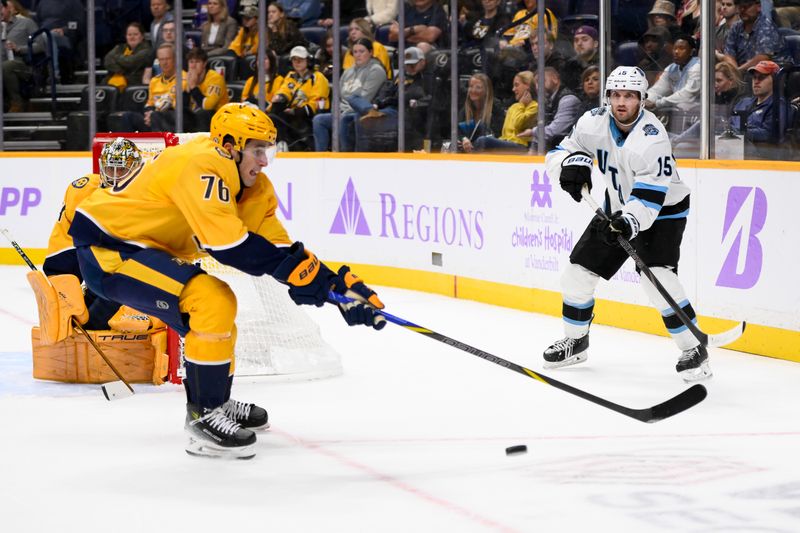 Nov 9, 2024; Nashville, Tennessee, USA;  Nashville Predators defenseman Brady Skjei (76) blocks the pass of Utah Hockey Club center Alexander Kerfoot (15) during the second period at Bridgestone Arena. Mandatory Credit: Steve Roberts-Imagn Images