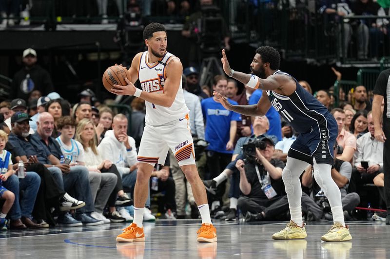 DALLAS, TX - NOVEMBER 8: Devin Booker #1 of the Phoenix Suns looks to pass the ball during the game against the Dallas Mavericks on November 6, 2024 at the American Airlines Center in Dallas, Texas. NOTE TO USER: User expressly acknowledges and agrees that, by downloading and or using this photograph, User is consenting to the terms and conditions of the Getty Images License Agreement. Mandatory Copyright Notice: Copyright 2024 NBAE (Photo by Glenn James/NBAE via Getty Images)