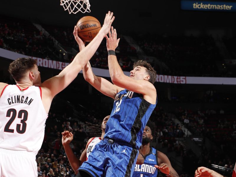 PORTLAND, OR - JANUARY 30:  Franz Wagner #22 of the Orlando Magic drives to the basket during the game against the Portland Trail Blazers on January 30, 2025 at the Moda Center Arena in Portland, Oregon. NOTE TO USER: User expressly acknowledges and agrees that, by downloading and or using this photograph, user is consenting to the terms and conditions of the Getty Images License Agreement. Mandatory Copyright Notice: Copyright 2025 NBAE (Photo by Cameron Browne/NBAE via Getty Images)