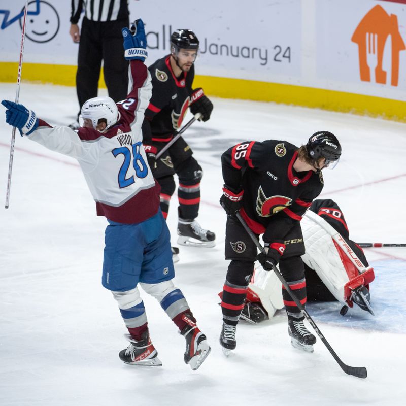 Jan 16, 2024; Ottawa, Ontario, CAN; Colorado Avalanche left wing Miles Woods (28) celebrates a goal scored against Ottawa Senators goalie Mads Sogaard (40) in the third period at the Canadian Tire Centre. Mandatory Credit: Marc DesRosiers-USA TODAY Sports