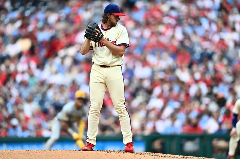 Jun 5, 2024; Philadelphia, Pennsylvania, USA; Philadelphia Phillies starting pitcher Aaron Nola (27) checks a runner against the Milwaukee Brewers in the third inning at Citizens Bank Park. Mandatory Credit: Kyle Ross-USA TODAY Sports