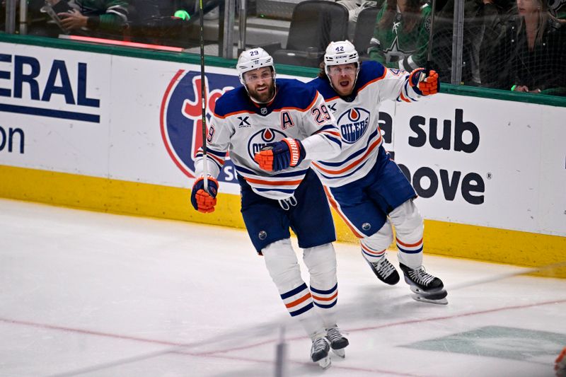 May 29, 2025; Dallas, Texas, USA; Edmonton Oilers center Leon Draisaitl (29) and right wing Kasperi Kapanen (42) react after a goal against the Dallas Stars during the third period in game five of the Western Conference Final of the 2025 Stanley Cup Playoffs at American Airlines Center. Mandatory Credit: Jerome Miron-Imagn Images