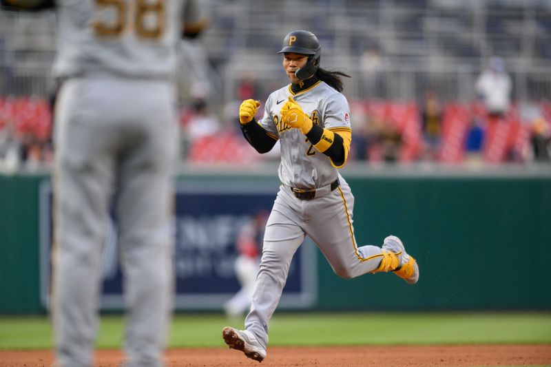 Apr 4, 2024; Washington, District of Columbia, USA; Pittsburgh Pirates designated hitter Connor Joe (2) reacts after hitting a home run during the fifth inning against the Washington Nationals at Nationals Park. Mandatory Credit: Reggie Hildred-USA TODAY Sports