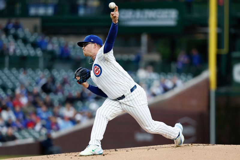 Apr 23, 2024; Chicago, Illinois, USA; Chicago Cubs starting pitcher Jordan Wicks (36) delivers a pitch against the Houston Astros during the first inning at Wrigley Field. Mandatory Credit: Kamil Krzaczynski-USA TODAY Sports