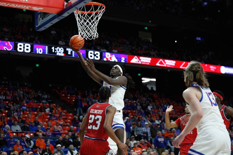 Feb 1, 2024; Boise, Idaho, USA; Boise State Broncos forward O'Mar Stanley (1) drives to the basket during the second half against the Fresno State Bulldogs at ExtraMile Arena. Boise State defeats Fresno State 90-66. Mandatory Credit: Brian Losness-USA TODAY Sports

