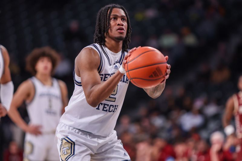 Jan 4, 2025; Atlanta, Georgia, USA; Georgia Tech Yellow Jackets guard Javian McCollum (2) shoots a free throw against the Boston College Eagles in the second half at McCamish Pavilion. Mandatory Credit: Brett Davis-Imagn Images
