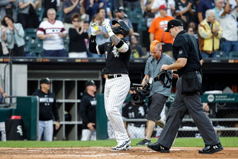 Aug 26, 2023; Chicago, Illinois, USA; Chicago White Sox third baseman Yoan Moncada (10) crosses home plate after hitting a three-run home run against the Oakland Athletics during the third inning at Guaranteed Rate Field. Mandatory Credit: Kamil Krzaczynski-USA TODAY Sports