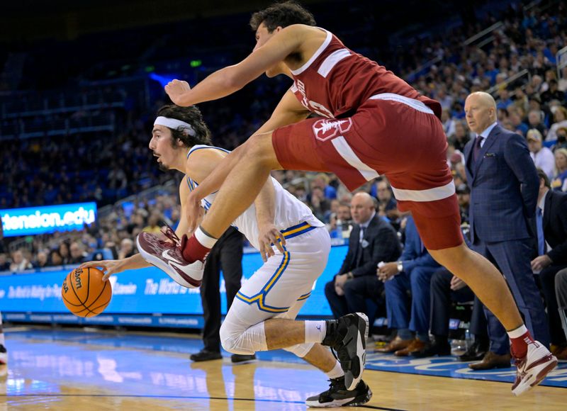 Feb 16, 2023; Los Angeles, California, USA; UCLA Bruins guard Jaime Jaquez Jr. (24) drives past Stanford Cardinal guard Michael Jones (13) in the second half at Pauley Pavilion presented by Wescom. Mandatory Credit: Jayne Kamin-Oncea-USA TODAY Sports