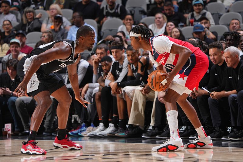 SAN ANTONIO, TX - NOVEMBER 13: Bilal Coulibaly #0 of the Washington Wizards dribbles the ball during the game against the San Antonio Spurs on November 13, 2024 at the Frost Bank Center in San Antonio, Texas. NOTE TO USER: User expressly acknowledges and agrees that, by downloading and or using this photograph, user is consenting to the terms and conditions of the Getty Images License Agreement. Mandatory Copyright Notice: Copyright 2024 NBAE (Photos byGarrett Ellwood/NBAE via Getty Images)