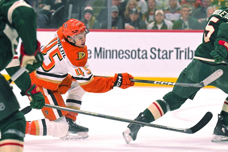 Nov 15, 2025; Saint Paul, Minnesota, USA;  Anaheim Ducks forward Beckett Sennecke (45) takes a shot against the Minnesota Wild during the first period at Grand Casino Arena. Mandatory Credit: Nick Wosika-Imagn Images