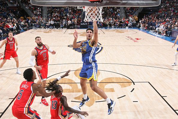 NEW ORLEANS, LA - OCTOBER 30: Trayce Jackson-Davis #32 of the Golden State Warriors  drives to the basket during the game against the New Orleans Pelicans on October 30, 2023 at the Smoothie King Center in New Orleans, Louisiana. NOTE TO USER: User expressly acknowledges and agrees that, by downloading and or using this Photograph, user is consenting to the terms and conditions of the Getty Images License Agreement. Mandatory Copyright Notice: Copyright 2023 NBAE (Photo by Layne Murdoch Jr./NBAE via Getty Images)