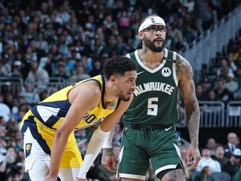 MILWAUKEE, WI - APRIL 25: Gary Trent Jr. #5 of the Milwaukee Bucks and Tyrese Haliburton #0 of the Indiana Pacers look on during the game during Round 1 Game 3 of the 2025 NBA Playoffs on April 25, 2025 at Fiserv Forum Center in Milwaukee, Wisconsin. NOTE TO USER: User expressly acknowledges and agrees that, by downloading and or using this Photograph, user is consenting to the terms and conditions of the Getty Images License Agreement. Mandatory Copyright Notice: Copyright 2025 NBAE(Photo by Jeff Haynes/NBAE via Getty Images).