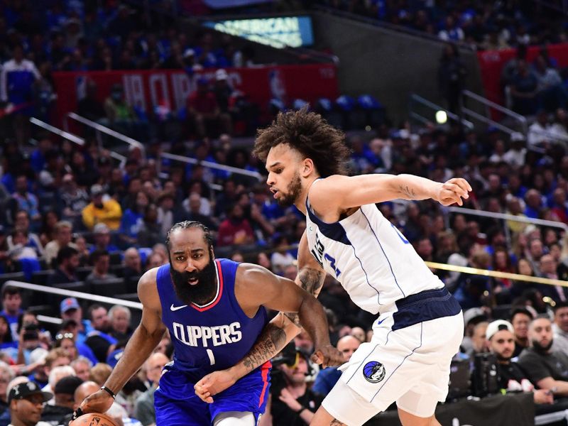 LOS ANGELES, CA - APRIL 21:  James Harden #1 of the LA Clippers handles the ball during the game against the Dallas Mavericks during Round 1 Game 1 of the 2024 NBA Playoffs on April 21, 2024 at Crypto.Com Arena in Los Angeles, California. NOTE TO USER: User expressly acknowledges and agrees that, by downloading and/or using this Photograph, user is consenting to the terms and conditions of the Getty Images License Agreement. Mandatory Copyright Notice: Copyright 2024 NBAE (Photo by Adam Pantozzi/NBAE via Getty Images)