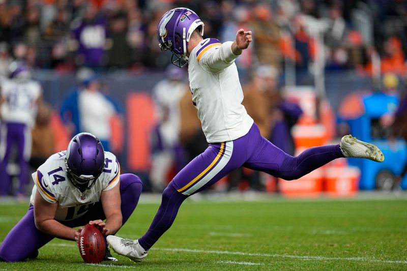 Minnesota Vikings kicker Greg Joseph kicks a point after during the first half on an NFL football game against the Denver Broncos, Sunday, Nov. 19, 2023, in Denver. (AP Photo/Jack Dempsey)