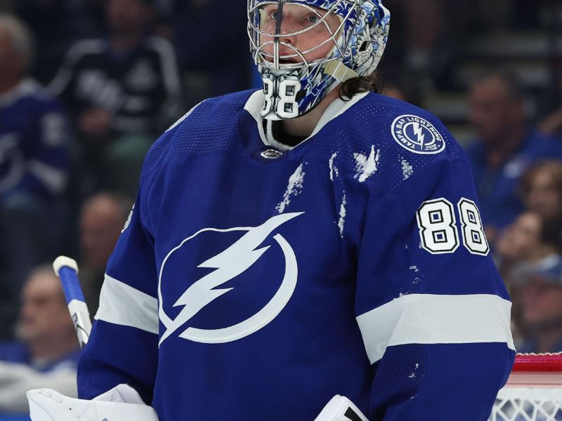 Dec 30, 2023; Tampa, Florida, USA; Tampa Bay Lightning goaltender Andrei Vasilevskiy (88) looks on against the New York Rangers during the second period at Amalie Arena. Mandatory Credit: Kim Klement Neitzel-USA TODAY Sports