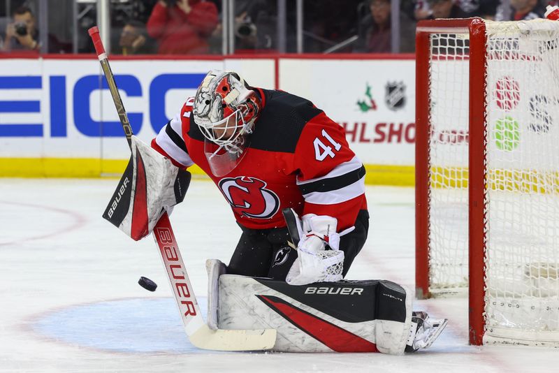 Dec 19, 2023; Newark, New Jersey, USA; New Jersey Devils goaltender Vitek Vanecek (41) makes a save against the Philadelphia Flyers during the first period at Prudential Center. Mandatory Credit: Ed Mulholland-USA TODAY Sports