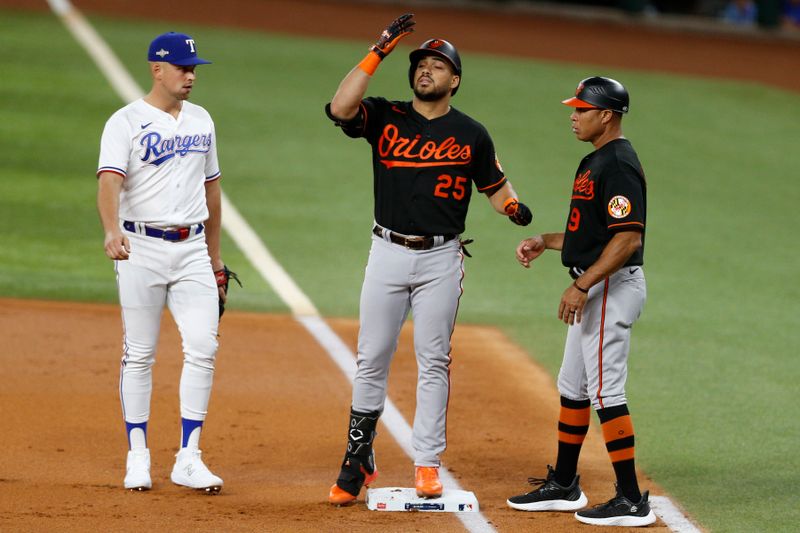 Oct 10, 2023; Arlington, Texas, USA; Baltimore Orioles right fielder Anthony Santander (25) reacts after hitting a single against the Texas Rangers in the first inning during game three of the ALDS for the 2023 MLB playoffs at Globe Life Field. Mandatory Credit: Andrew Dieb-USA TODAY Sports