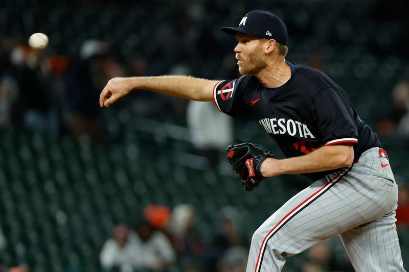 Apr 12, 2024; Detroit, Michigan, USA;  Minnesota Twins relief pitcher Michael Tonkin (39) pitches in the sixth inning against the Detroit Tigers at Comerica Park. Mandatory Credit: Rick Osentoski-USA TODAY Sports