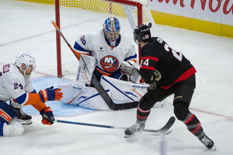 Oct 18, 2025; Ottawa, Ontario, CAN; New York Islanders goalie Ilya Sorokin (30) makes a save on a shot from  Ottawa Senators center Dylan Cozens (24) in the third period at the Canadian Tire Centre. Mandatory Credit: Marc DesRosiers-IMAGN Images