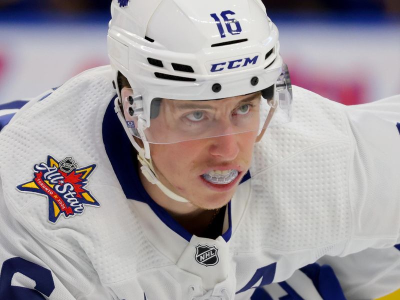 Dec 21, 2023; Buffalo, New York, USA;  Toronto Maple Leafs right wing Mitchell Marner (16) waits for the face-off during the first period against the Buffalo Sabres at KeyBank Center. Mandatory Credit: Timothy T. Ludwig-USA TODAY Sports