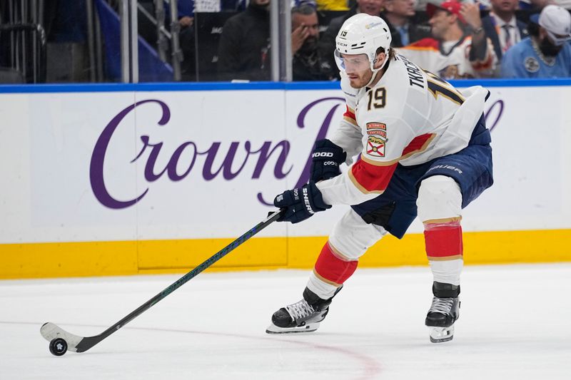 May 14, 2025; Toronto, Ontario, CAN; Florida Panthers forward Matthew Tkachuk (19) gets control of the puck against the Toronto Maple Leafs during the third period of game five of the second round of the 2025 Stanley Cup Playoffs at Scotiabank Arena. Mandatory Credit: John E. Sokolowski-Imagn Images