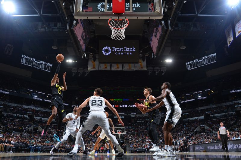 SAN ANTONIO, TX - OCTOBER 12: Cody Williams #5 of the Utah Jazz shoots the ball during the game against the San Antonio Spurs during a NBA pre season game on October 12, 2024 at the Frost Bank Center in San Antonio, Texas. NOTE TO USER: User expressly acknowledges and agrees that, by downloading and or using this photograph, user is consenting to the terms and conditions of the Getty Images License Agreement. Mandatory Copyright Notice: Copyright 2024 NBAE (Photos by Michael Gonzales/NBAE via Getty Images)