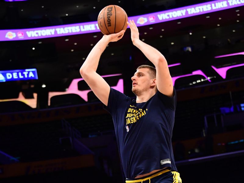 LOS ANGELES, CA - MARCH 2: Nikola Jokic #15 of the Denver Nuggets warms up before the game against the Los Angeles Lakers on March 2, 2024 at Crypto.Com Arena in Los Angeles, California. NOTE TO USER: User expressly acknowledges and agrees that, by downloading and/or using this Photograph, user is consenting to the terms and conditions of the Getty Images License Agreement. Mandatory Copyright Notice: Copyright 2024 NBAE (Photo by Adam Pantozzi/NBAE via Getty Images)