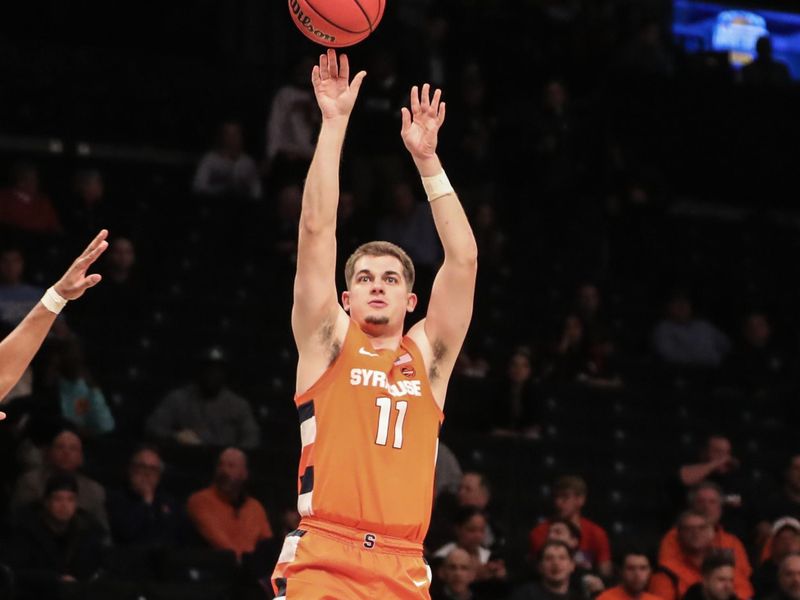 Nov 21, 2022; Brooklyn, New York, USA;  Syracuse Orange guard Joseph Girard III (11) takes a three point shot  in the first half against the Richmond Spiders at Barclays Center. Mandatory Credit: Wendell Cruz-USA TODAY Sports