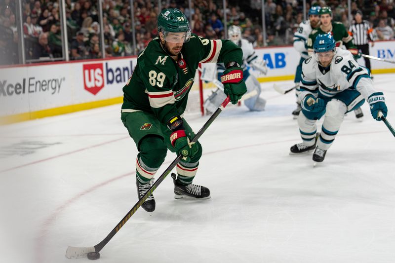 Mar 3, 2024; Saint Paul, Minnesota, USA; Minnesota Wild center Frederick Gaudreau (89) looks to pass as San Jose Sharks defenseman Jan Rutta (84) defends in the second period at Xcel Energy Center. Mandatory Credit: Matt Blewett-USA TODAY Sports