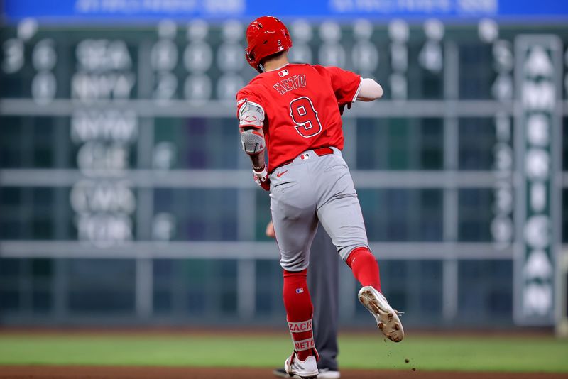 May 20, 2024; Houston, Texas, USA; Los Angeles Angels shortstop Zach Neto (9) rounds the bases after hitting a home run to left field against the Houston Astros during the sixth inning at Minute Maid Park. Mandatory Credit: Erik Williams-USA TODAY Sports