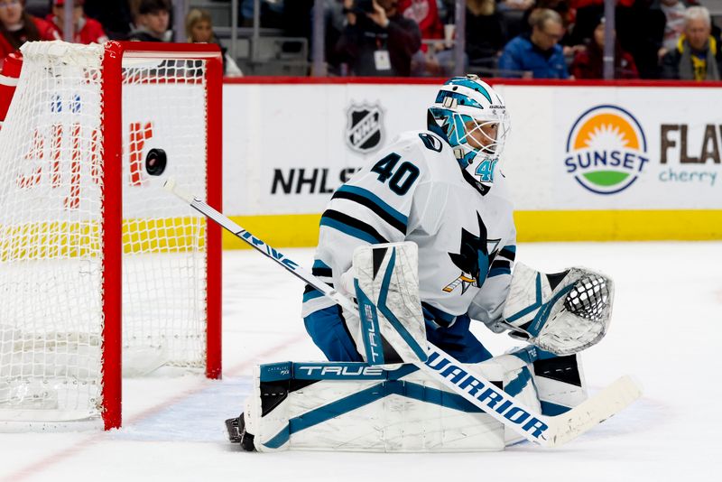Jan 14, 2025; Detroit, Michigan, USA;  San Jose Sharks goaltender Alexandar Georgiev (40) makes a save in the second period against the Detroit Red Wings at Little Caesars Arena. Mandatory Credit: Rick Osentoski-Imagn Images