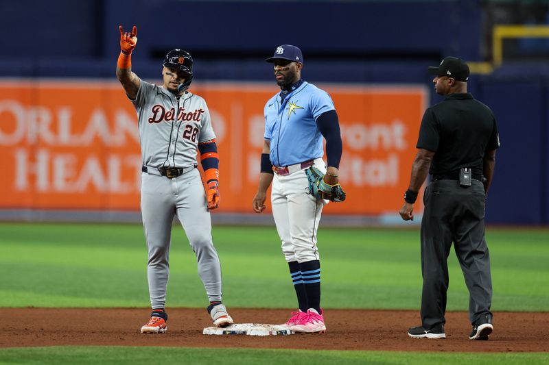 Apr 24, 2024; St. Petersburg, Florida, USA;  Detroit Tigers shortstop Javier Baez (28) reacts after hitting an rbi double against the Tampa Bay Rays in the sixth inning at Tropicana Field. Mandatory Credit: Nathan Ray Seebeck-USA TODAY Sports