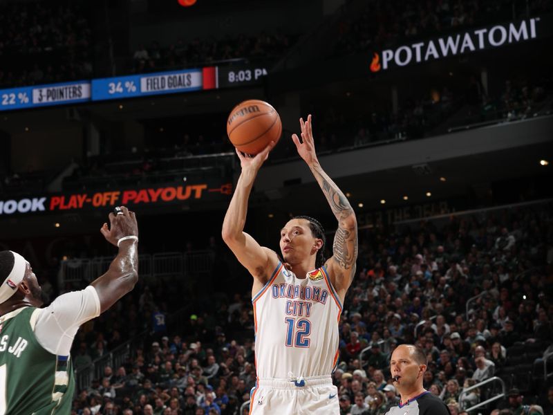 MILWAUKEE, WI - MARCH 24: Lindy Waters III #12 of the Oklahoma City Thunder shoots the ball during the game against the Milwaukee Bucks on March 24, 2024 at the Fiserv Forum Center in Milwaukee, Wisconsin. NOTE TO USER: User expressly acknowledges and agrees that, by downloading and or using this Photograph, user is consenting to the terms and conditions of the Getty Images License Agreement. Mandatory Copyright Notice: Copyright 2024 NBAE (Photo by Gary Dineen/NBAE via Getty Images).