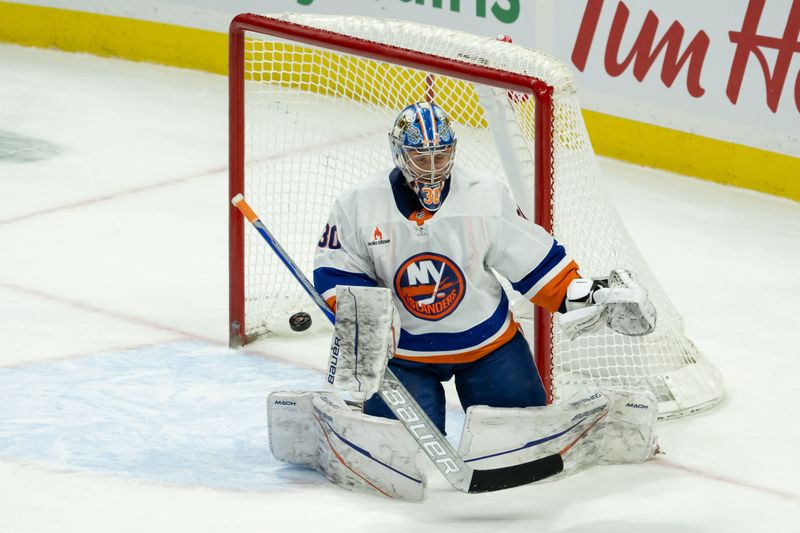 Dec 8, 2024; Ottawa, Ontario, CAN; New York Islanders goalie Ilya Sorokin (30) makes a save in the third period against the Ottawa Senators at the Canadian Tire Centre. Mandatory Credit: Marc DesRosiers-Imagn Images