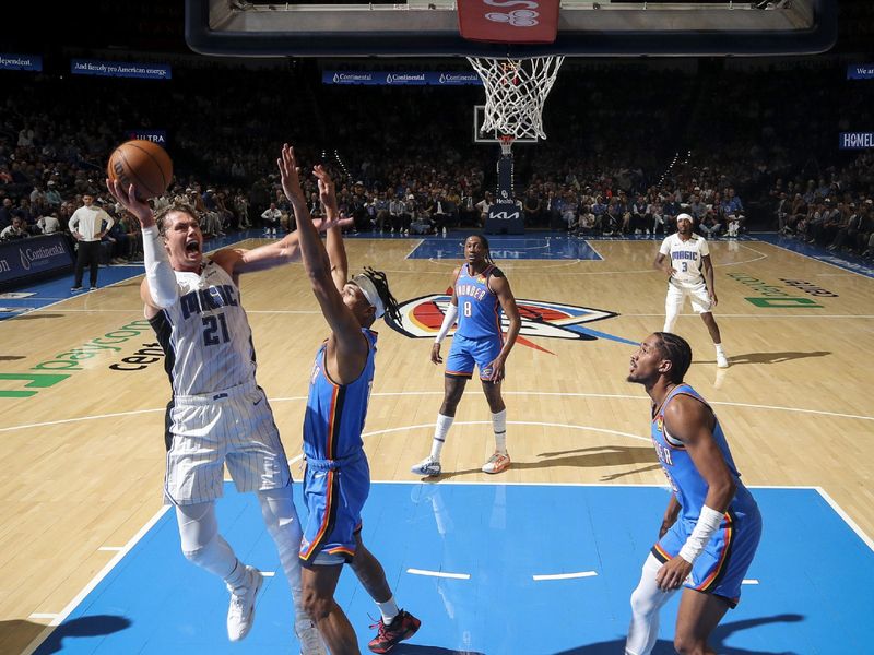 OKLAHOMA CITY, OK - NOVEMBER 4:  Moritz Wagner #21 of the Orlando Magic shoots the ball during the game against the Oklahoma City Thunder on November 4, 2024 at Paycom Center in Oklahoma City, Oklahoma. NOTE TO USER: User expressly acknowledges and agrees that, by downloading and or using this photograph, User is consenting to the terms and conditions of the Getty Images License Agreement. Mandatory Copyright Notice: Copyright 2024 NBAE (Photo by Zach Beeker/NBAE via Getty Images)