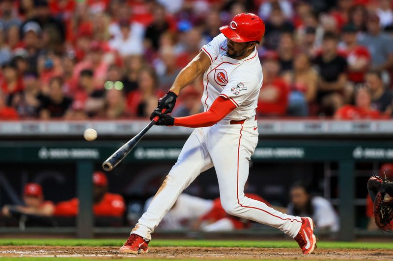 Jun 12, 2024; Cincinnati, Ohio, USA; Cincinnati Reds third baseman Jeimer Candelario (3) hits a three-run home run in the sixth inning against the Cleveland Guardians at Great American Ball Park. Mandatory Credit: Katie Stratman-USA TODAY Sports