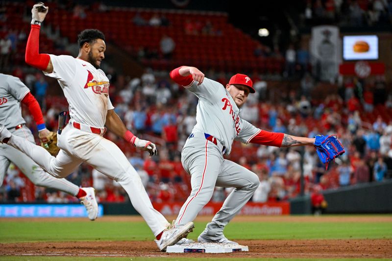 Apr 8, 2024; St. Louis, Missouri, USA;  Philadelphia Phillies pitcher Jeff Hoffman (23) forces out St. Louis Cardinals center fielder Victor Scott II (11) during the ninth inning at Busch Stadium. Mandatory Credit: Jeff Curry-USA TODAY Sports