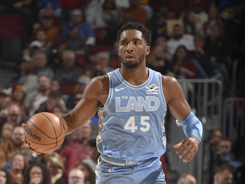 CLEVELAND, OH - DECEMBER 8: Donovan Mitchell #45 of the Cleveland Cavaliers dribbles the ball during the game against the Denver Nuggets on December 5, 2024 at Rocket Mortgage FieldHouse in Cleveland, Ohio. NOTE TO USER: User expressly acknowledges and agrees that, by downloading and/or using this Photograph, user is consenting to the terms and conditions of the Getty Images License Agreement. Mandatory Copyright Notice: Copyright 2024 NBAE (Photo by David Liam Kyle/NBAE via Getty Images)