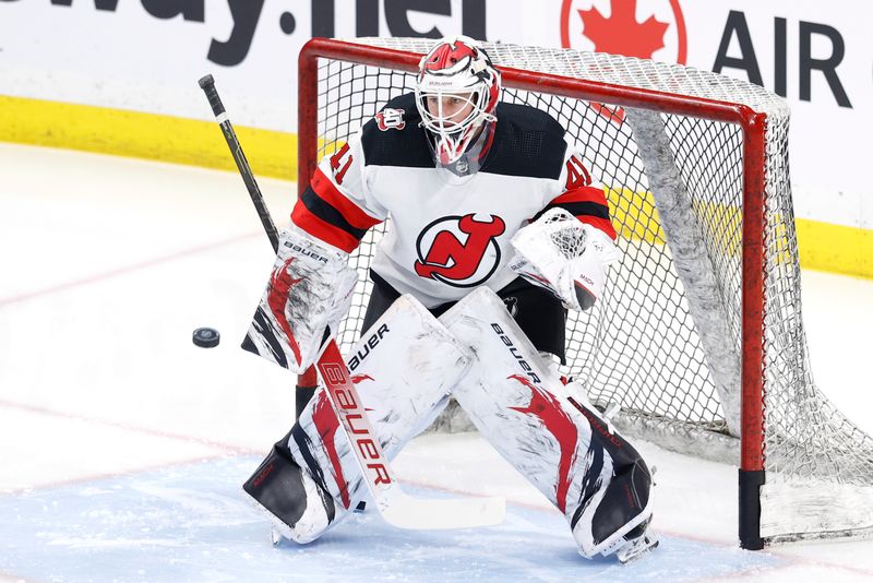 Apr 2, 2023; Winnipeg, Manitoba, CAN; New Jersey Devils goaltender Vitek Vanecek (41) warms up before game against the Winnipeg Jets at Canada Life Centre. Mandatory Credit: James Carey Lauder-USA TODAY Sports