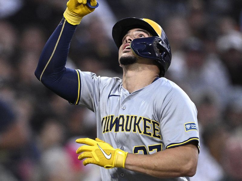 Jun 20, 2024; San Diego, California, USA; Milwaukee Brewers shortstop Willy Adames (27) celebrates after hitting a two-run home run against the San Diego Padres during the fifth inning at Petco Park. Mandatory Credit: Orlando Ramirez-USA TODAY Sports