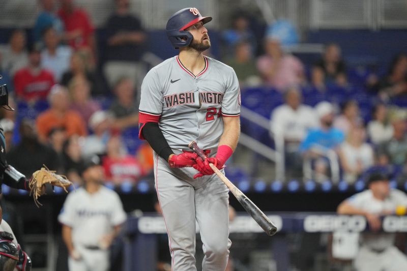 Sep 3, 2024; Miami, Florida, USA;  Washington Nationals first baseman Joey Gallo (24) watches his three-run home run during the fourth inning against the Miami Marlins at loanDepot Park. Mandatory Credit: Jim Rassol-Imagn Images.