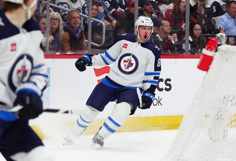 Apr 28, 2024; Denver, Colorado, USA; Winnipeg Jets defenseman Nate Schmidt (88) celebrates his goal during the first period against the Colorado Avalanche in game four of the first round of the 2024 Stanley Cup Playoffs at Ball Arena. Mandatory Credit: Ron Chenoy-USA TODAY Sports