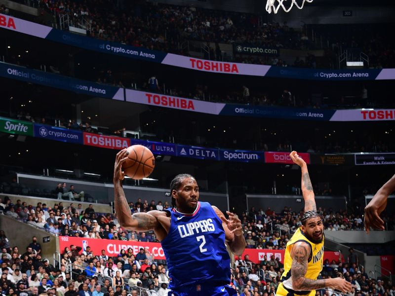 LOS ANGELES, CA - MARCH 25: Kawhi Leonard #2 of the LA Clippers looks to pass the ball during the game against the Indiana Pacers on March 25, 2024 at Crypto.Com Arena in Los Angeles, California. NOTE TO USER: User expressly acknowledges and agrees that, by downloading and/or using this Photograph, user is consenting to the terms and conditions of the Getty Images License Agreement. Mandatory Copyright Notice: Copyright 2024 NBAE (Photo by Adam Pantozzi/NBAE via Getty Images)