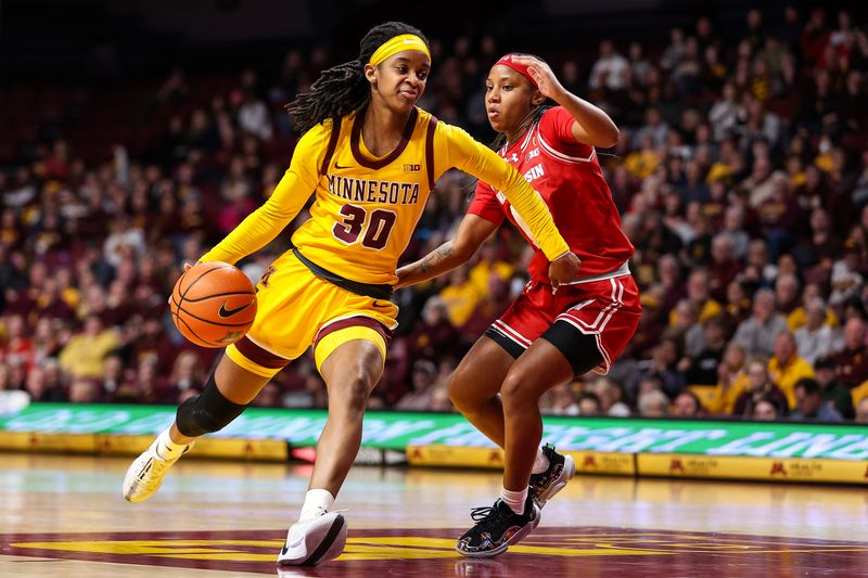 Feb 20, 2024; Minneapolis, Minnesota, USA; Minnesota Golden Gophers guard Janay Sanders (30) works around Wisconsin Badgers guard Ronnie Porter (13) during the first half at Williams Arena. Mandatory Credit: Matt Krohn-USA TODAY Sports