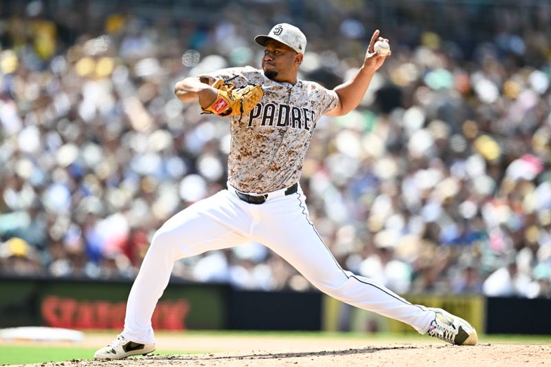 May 18, 2025; San Diego, California, USA; San Diego Padres relief pitcher Wandy Peralta (58) delivers during the seventh inning against the Seattle Mariners at Petco Park. Mandatory Credit: Denis Poroy-Imagn Images